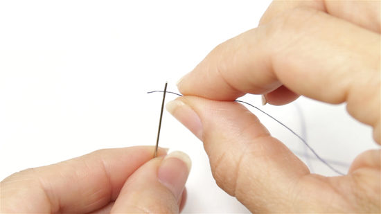 How to thread a needle?